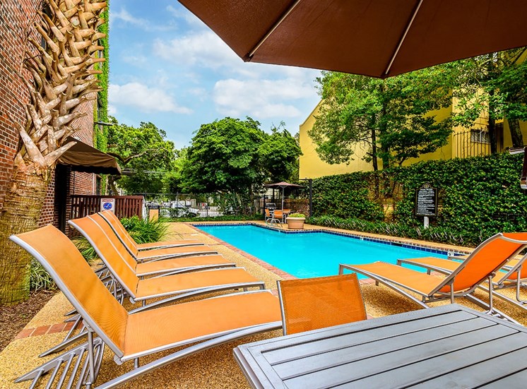 The Georgian's courtyard pool area features ample lounge seating and tables